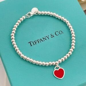 Tiffany & Co. Silver Bracelet with Red Heart Charm